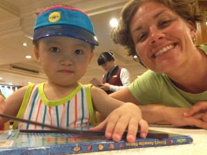 He doesn't eat with chopsticks yet. Local guides told me sometimes it takes until kids are 4-5 before they master them.