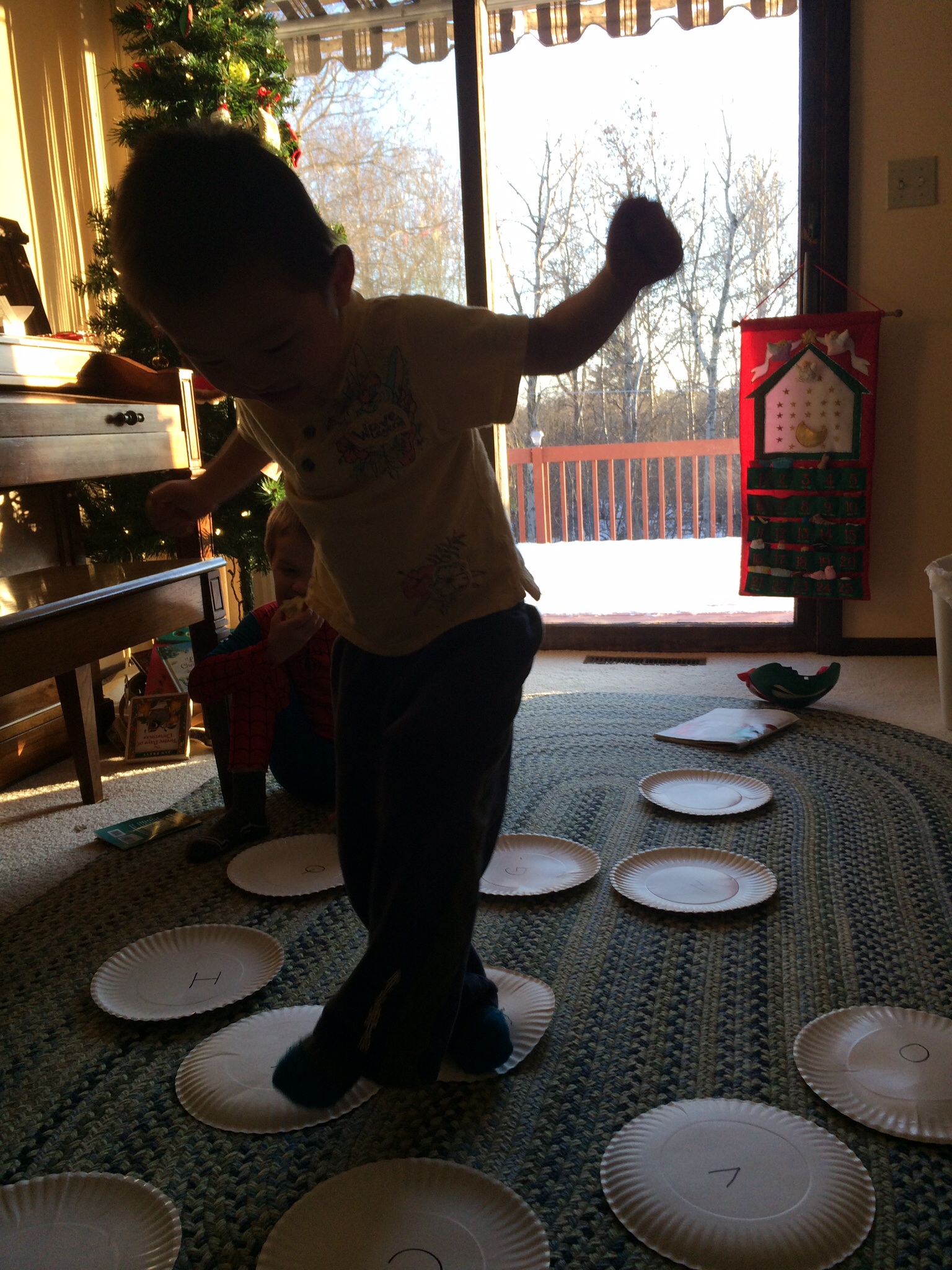 We write the Chinese characters on plates and make up all sorts of games. We also have the alphabet on plates. Calista has to spell, Elam has to make the sound and XS has to find the letter: 3 for 1 educational CHEAP game.